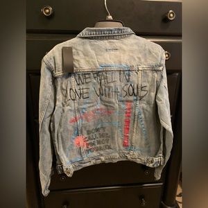 Denim Jacket with writing on it